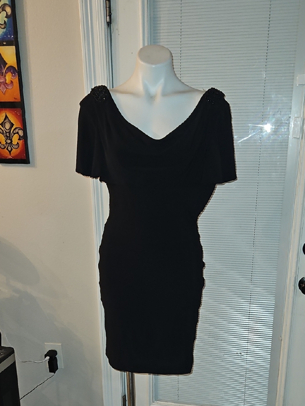 Elegant Black Off-Shoulder Mini Dress with Beaded Shoulders